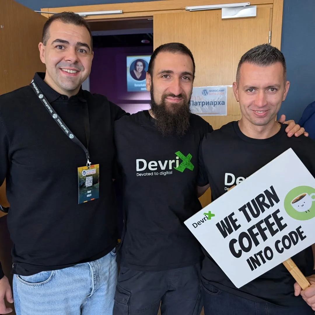 DevriXians with the We Turn Coffee Into Code sign