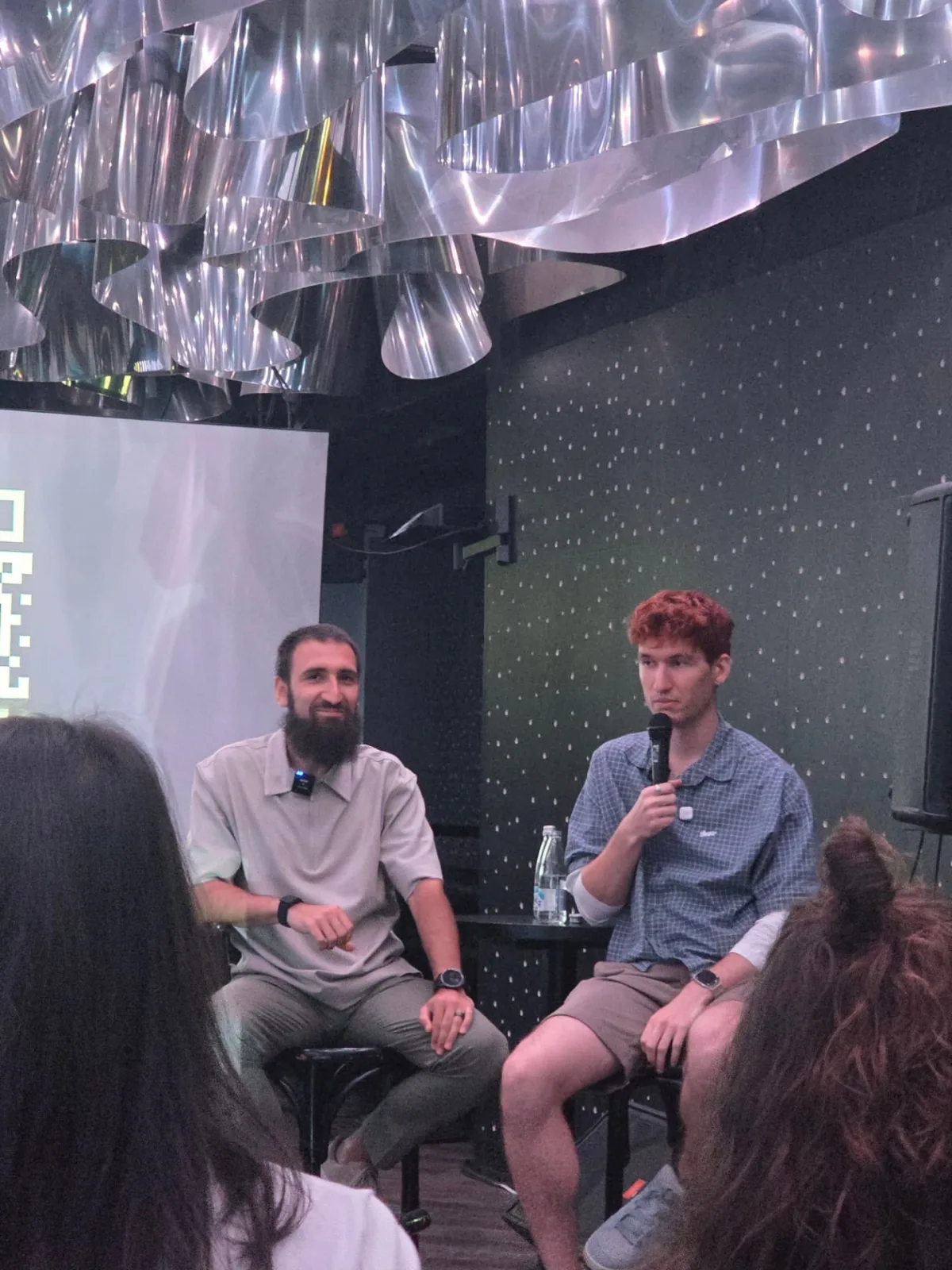 Fireside chat with speakers on stage