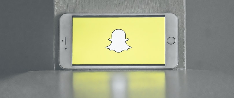 snapchat logo on an iphone screen